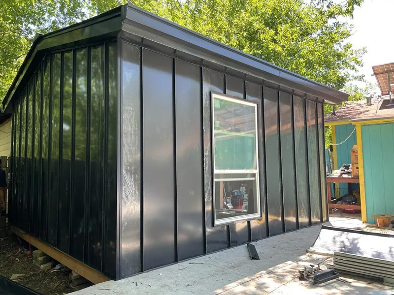 Black standing seam metal wall panels for Metal Roof Installation in Oakwood